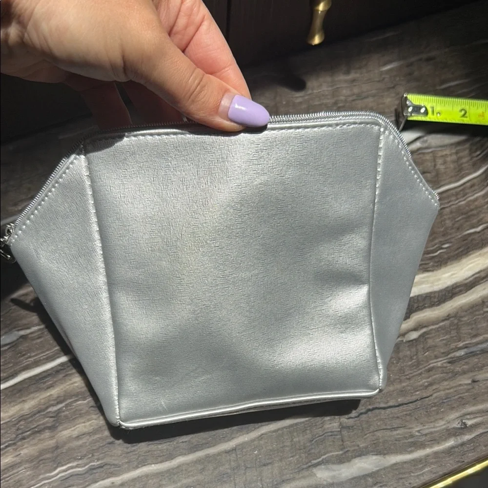 La Prairie Silver Cosmetic Bag with Geometric Design